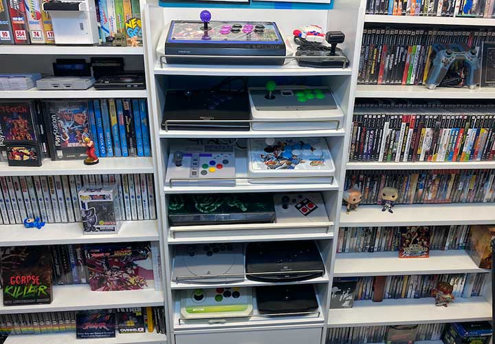 storage hack to use shoe display shelf as a display for joysticks and video game consoles